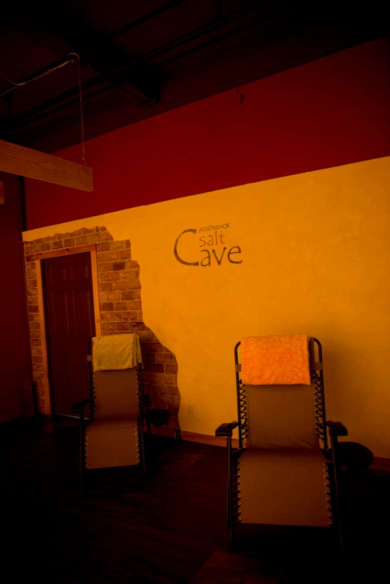 lounge chairs against a wall