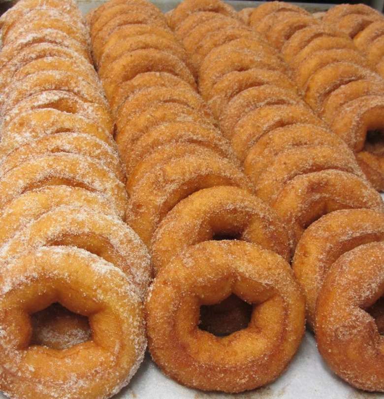 sheet tray of apple cider doughnuts