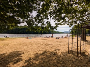 people on beach and playground at haviland cove