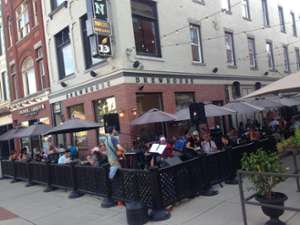people on patio outside a restaurant