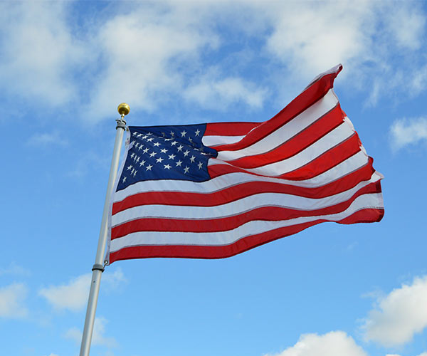 american flag on a sunny day