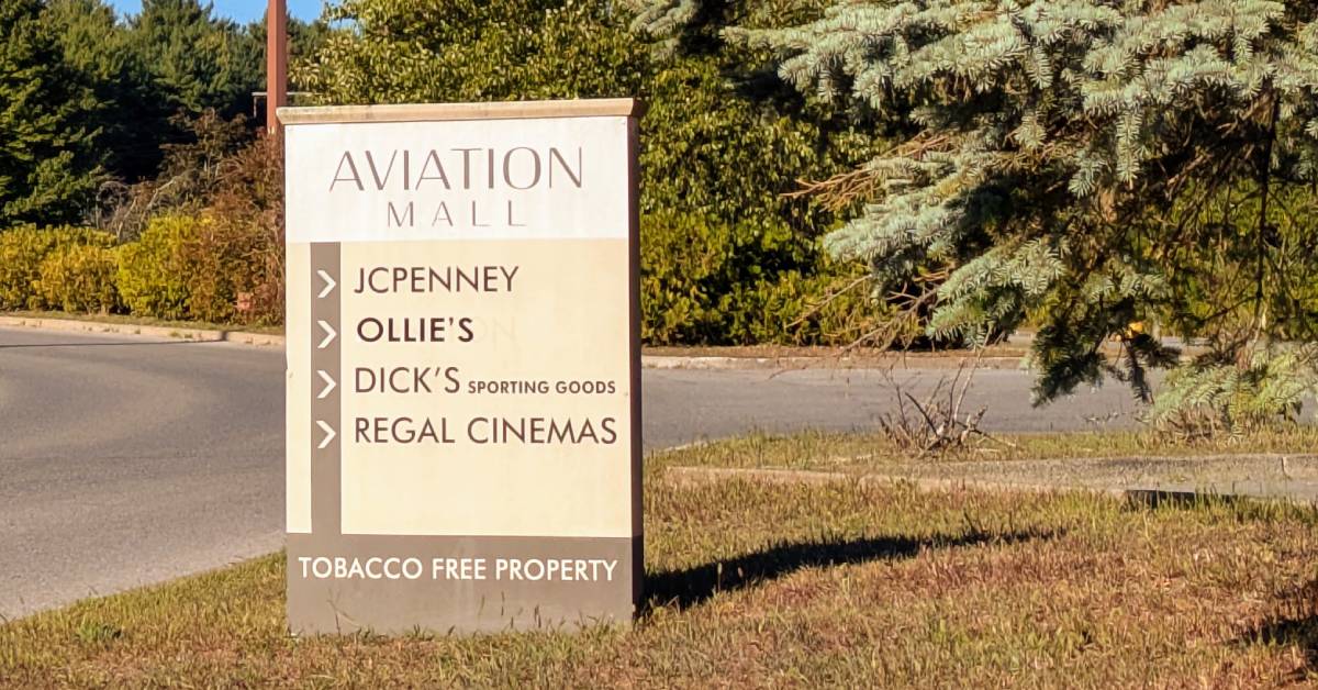aviation mall sign listing jcpenny, ollie's dick's, and regal cinemas