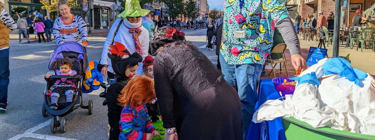 costumed kids trick or treating at boo 2 you