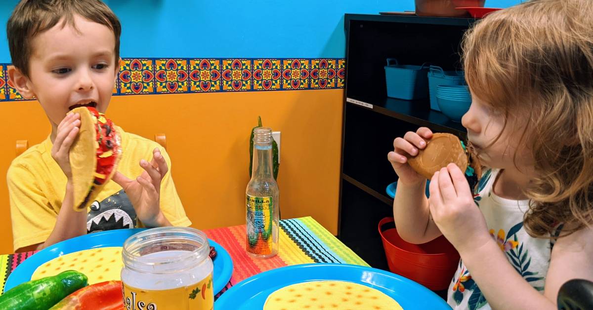kids at mexican kitchen at world awareness children's museum