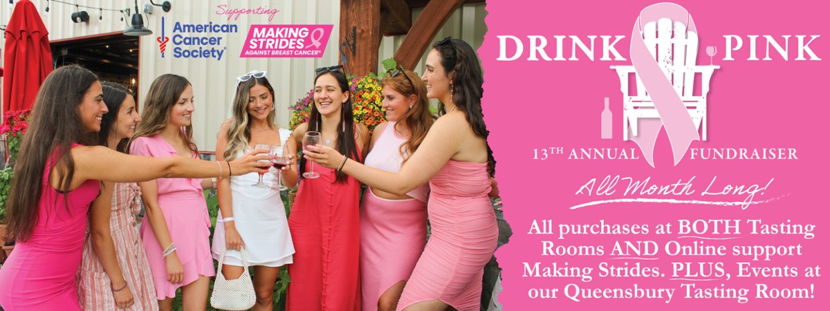 women cheersing at drink pink event