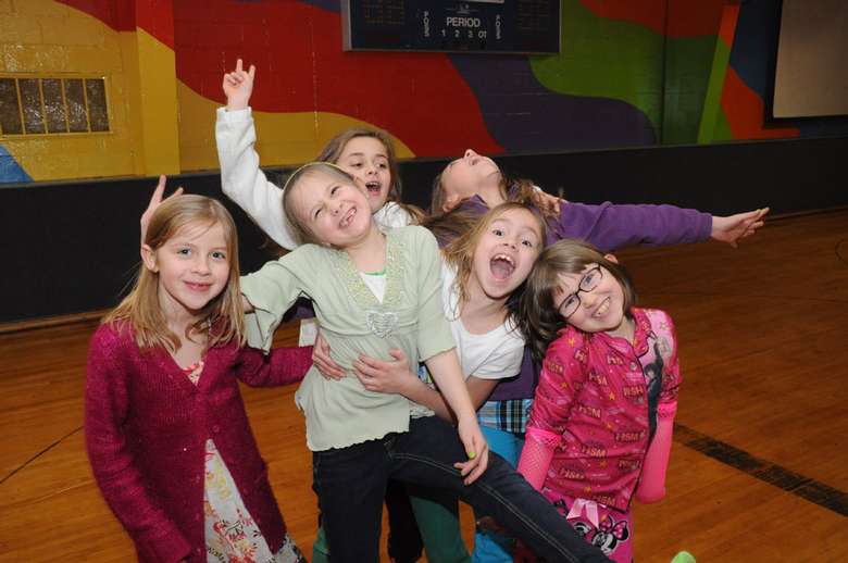 several kids posing together