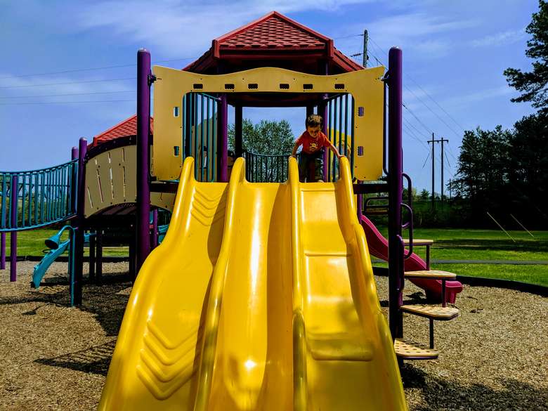 kid and slides