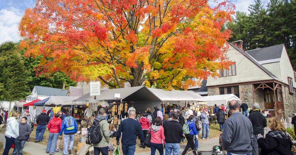 garage sale and tree with fall foliage
