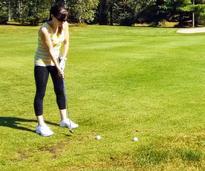 woman golfing