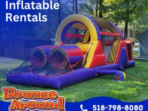 Inflatable obstacle course rental set up outdoors