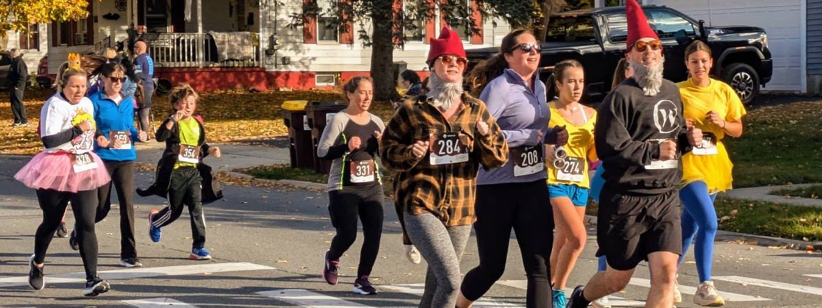 people in costumes including gnomes running 5k
