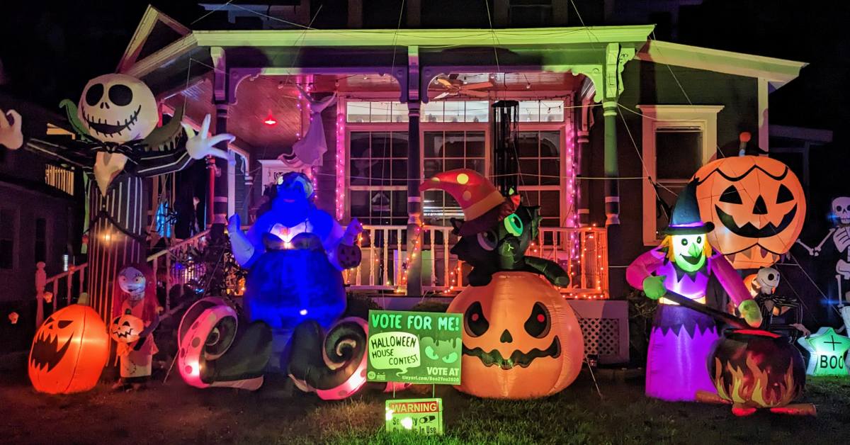colorful and inflatable halloween decorations at a house