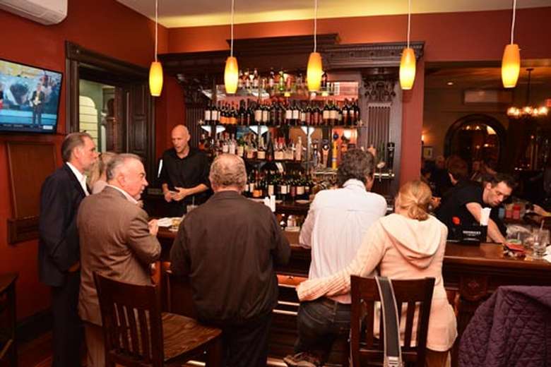 people enjoying the bar