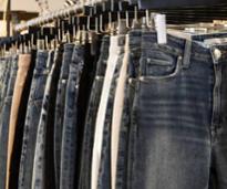 jeans hanging on display in store