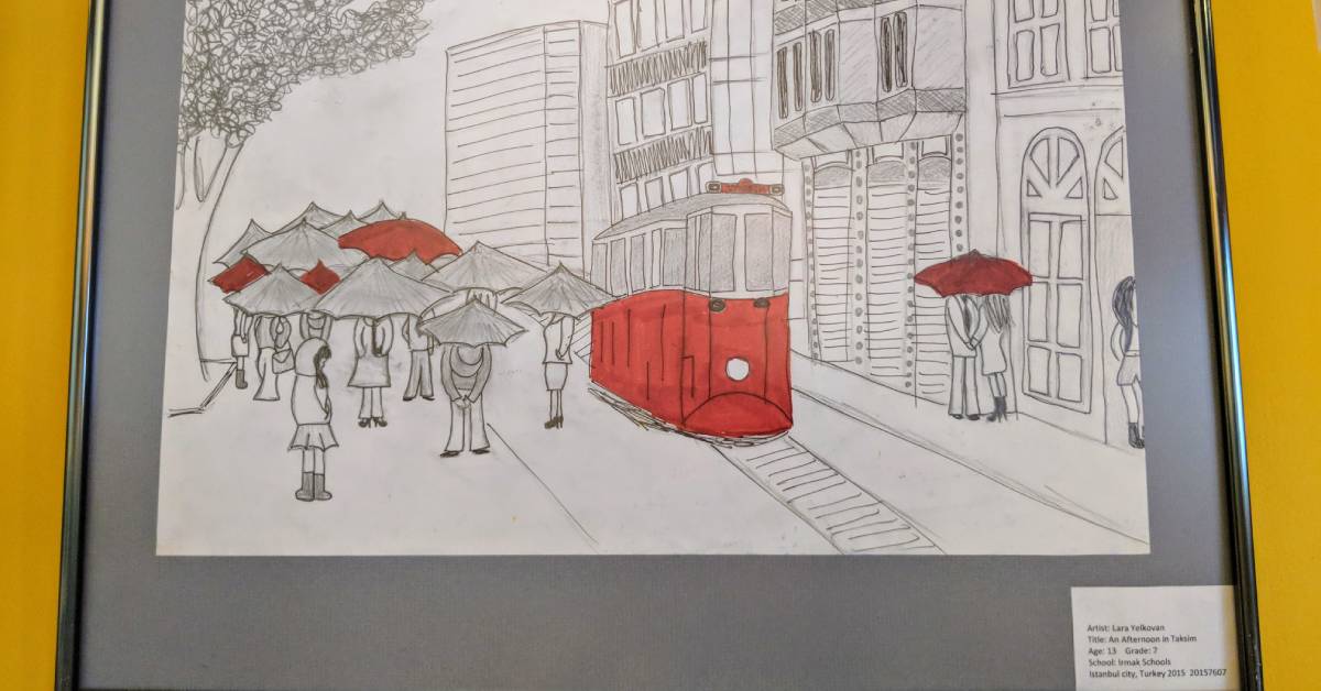 kids picture, red and black and white, with umbrella and bus
