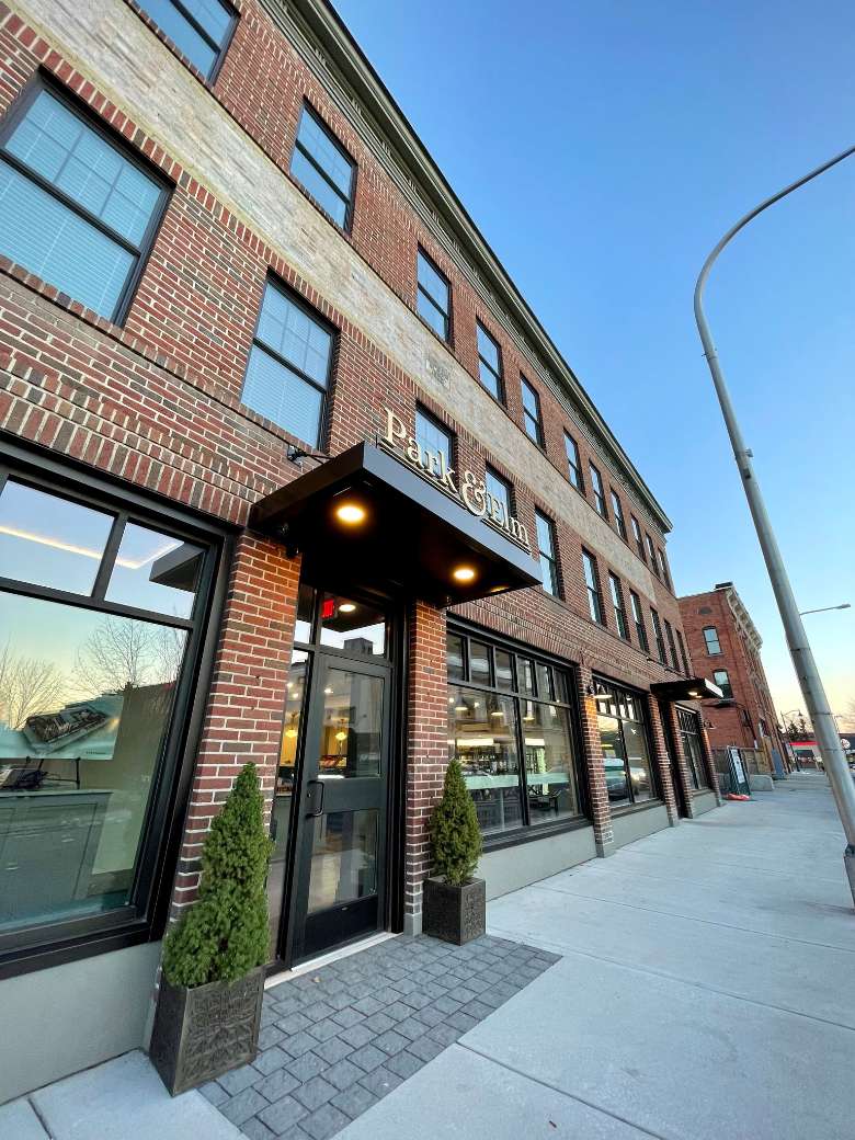 Park & Elm is a multi-concept eatery with a gourmet market, delicatessen, and fine dining restaurant. outside of Park & Elm