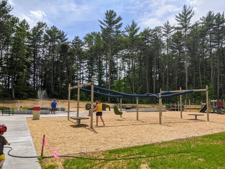 accessible playground and splash pad at park