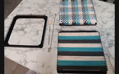 70s style potholder loom with turquise and black cotton