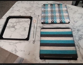 70s style potholder loom with turquise and black cotton