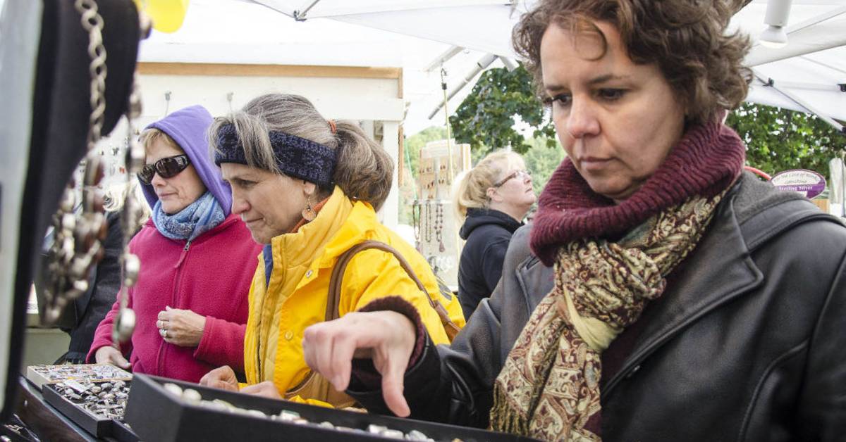 women shop jewelry at world's largest garage sale