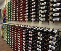 wall of wine racks and bottles